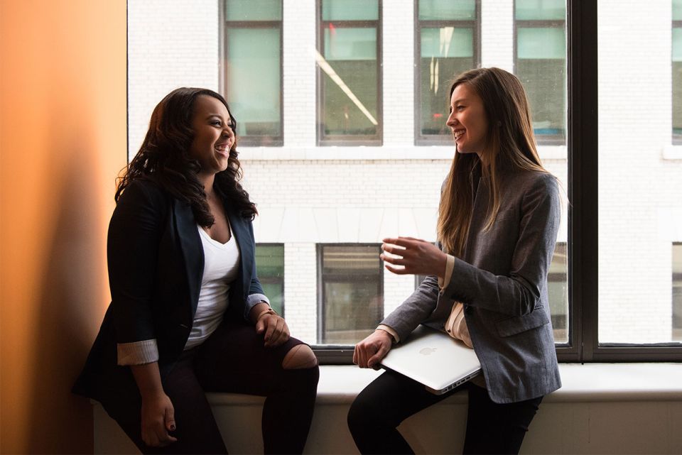 Two professional women at work.